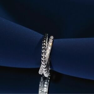 Elegant Silver Cross Over Band Ring